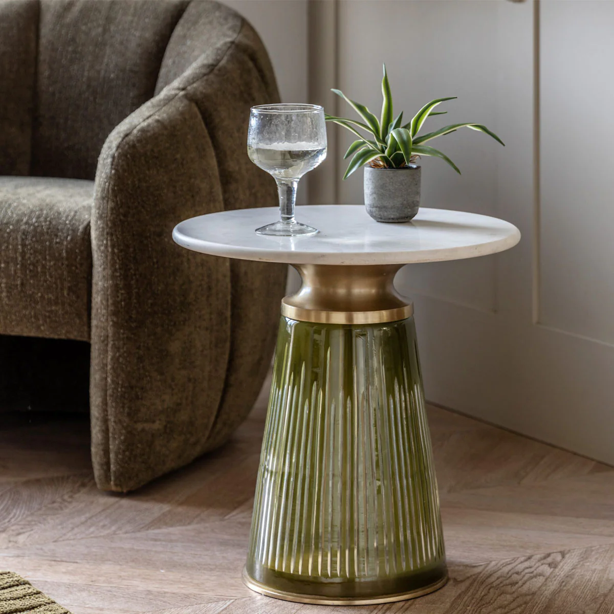 green and white glass and marble side table