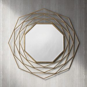 Octagonal wall mirror with gold metal frame and bevelled glass