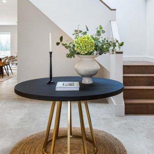 Round dining table with brass base and concrete resin top medium sized seats 4-6