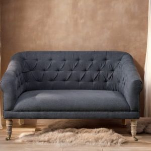 Nkuku linen loveseat in charcoal grey.