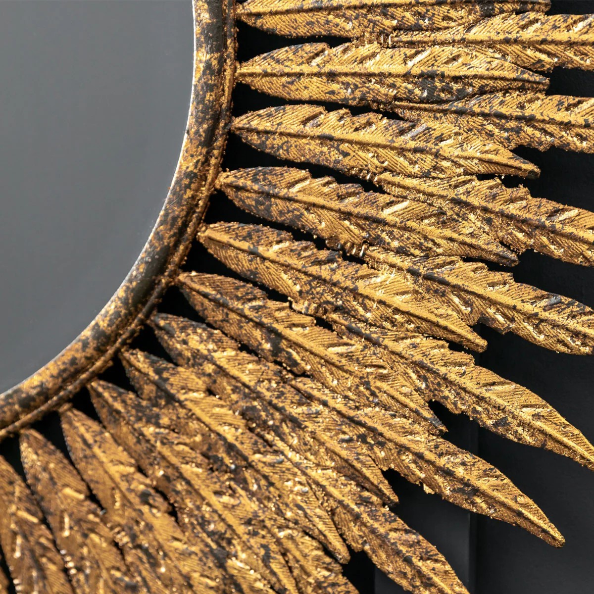 Ornate wall hanging mirror with aged gold finish
