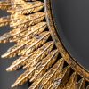 Ornate wall hanging mirror with aged gold finish