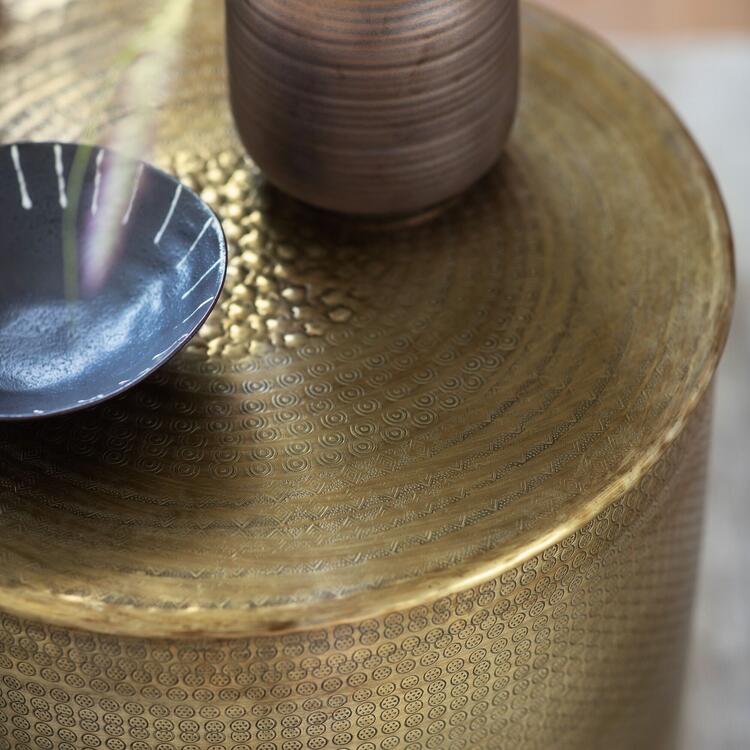 embossed round metal side table antique brass finish