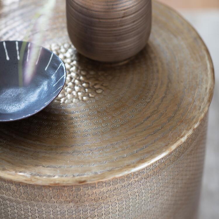 embossed round metal side table antique brass finish