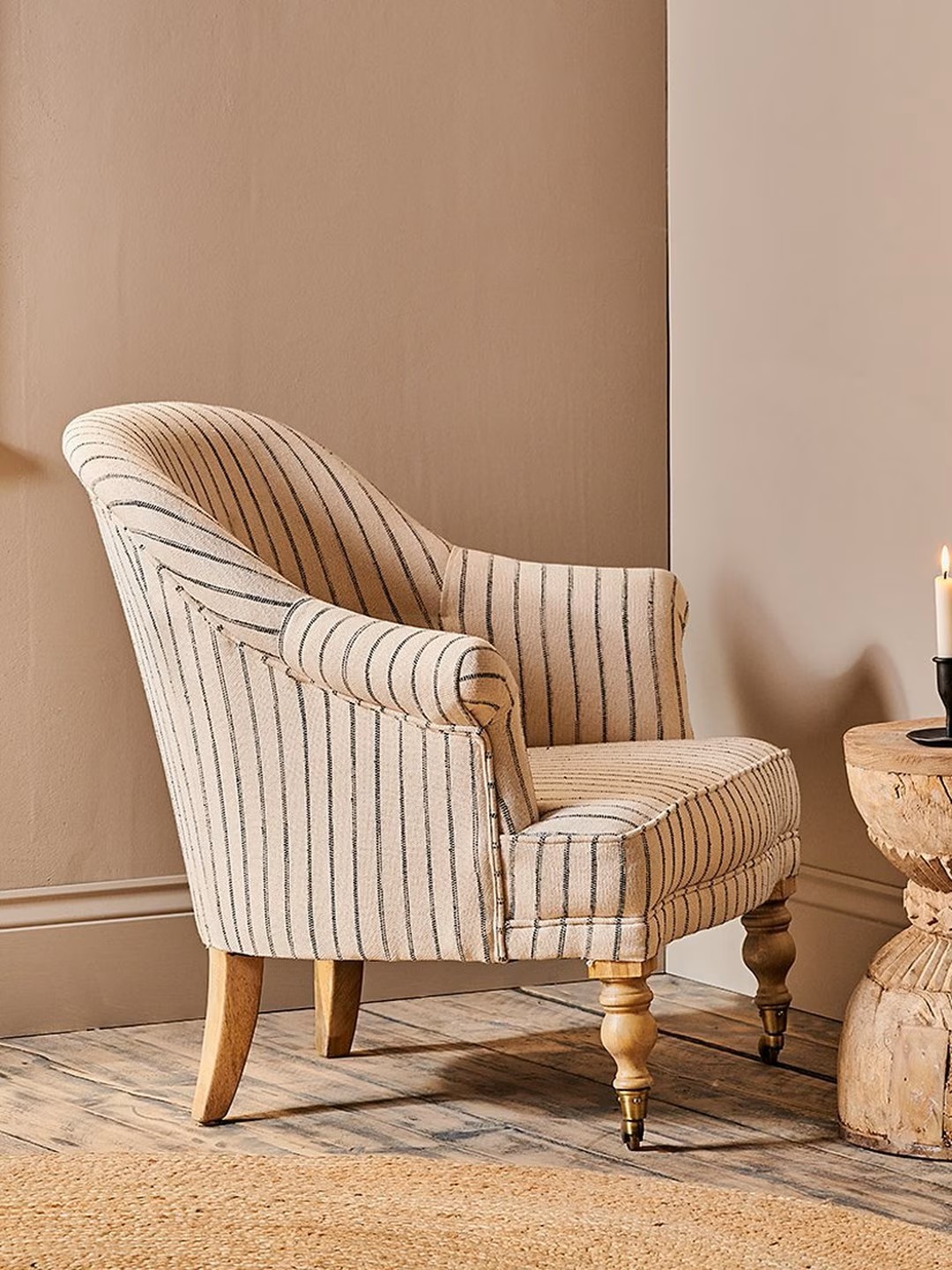 Nkuku grey linen armchair with turned mango wood legs
