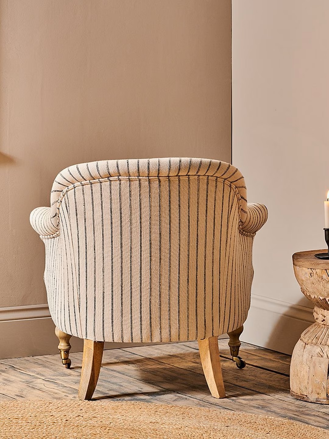 Nkuku grey linen armchair with turned mango wood legs