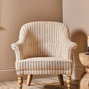 Nkuku grey linen armchair with turned mango wood legs