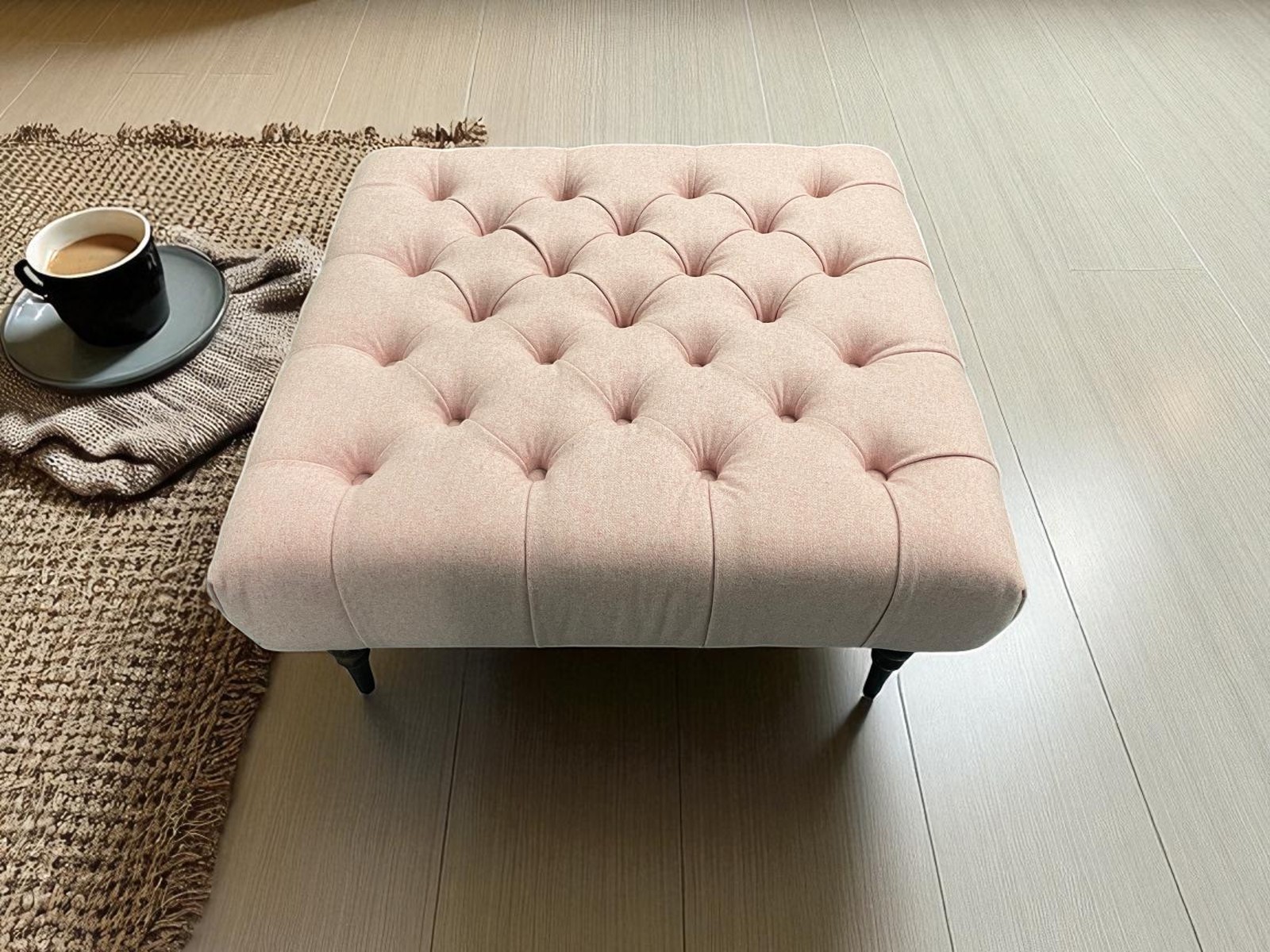 pink button-tufted upholstery footstool