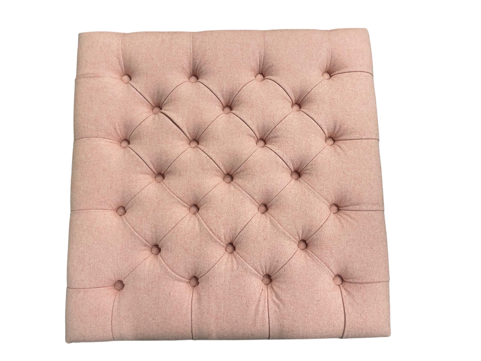 pink button-tufted upholstery footstool