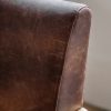 Brown leather armchair